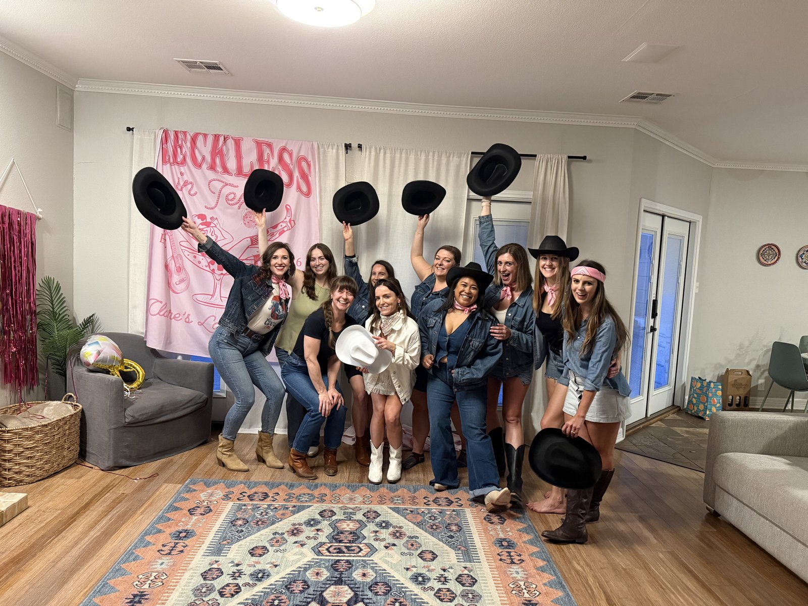 Austin bachelorette party with cowboy hats Reckless in Texas theme