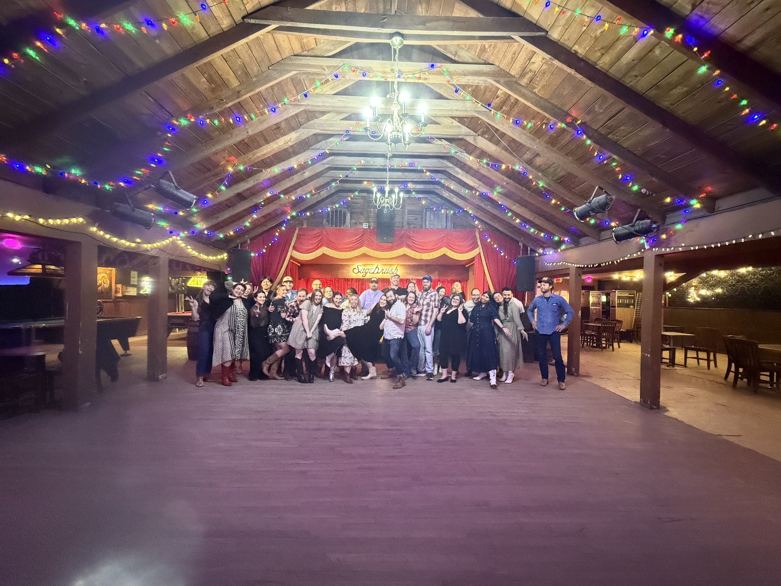 Large multi-generational group dance lesson at Austin honky-tonk