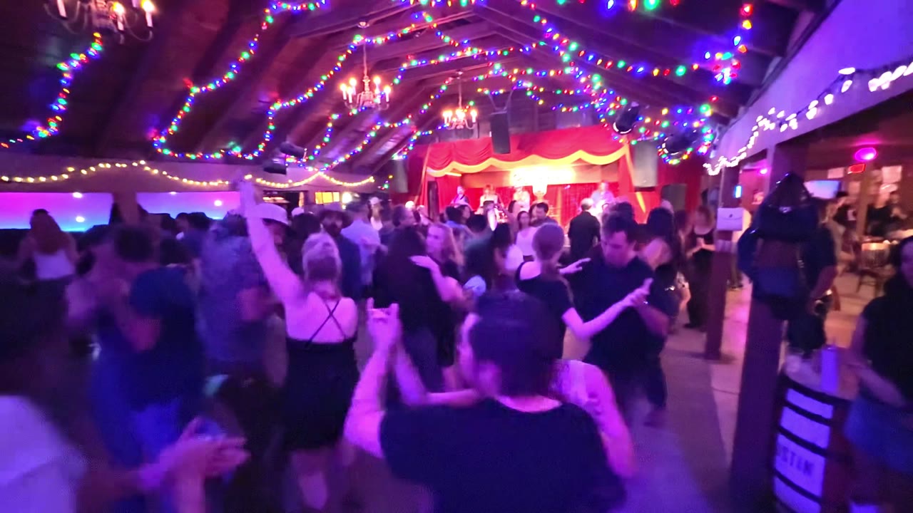 Dancers two-stepping on a packed floor at Sagebrush in Austin